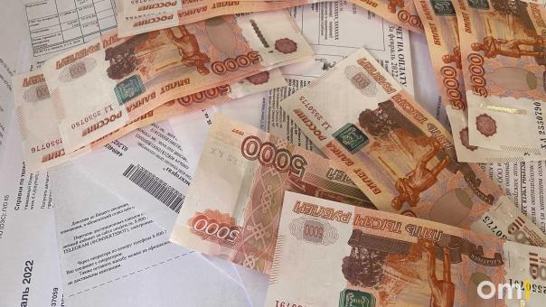 Омичам простят проценты по долгам по «коммуналку»