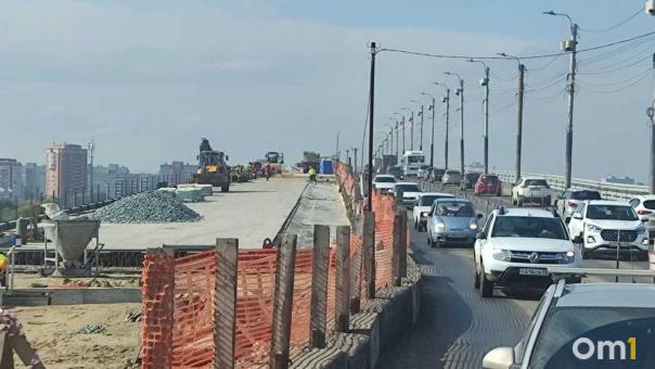 Перед строителями, работающими на мосту у Телецентра, погасили долги