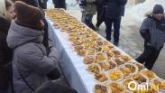 На Масленице в Омске установили гастрономический рекорд – 2036 тыквенных оладий