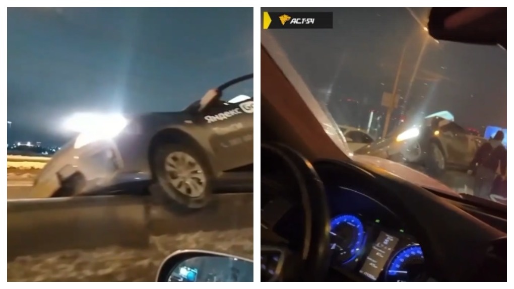 Видео повисшего «Яндекс.Такси» на отбойнике на Димитровском мосту появилось в сети