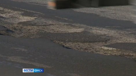 Асфальт в Омске растаял раньше снега