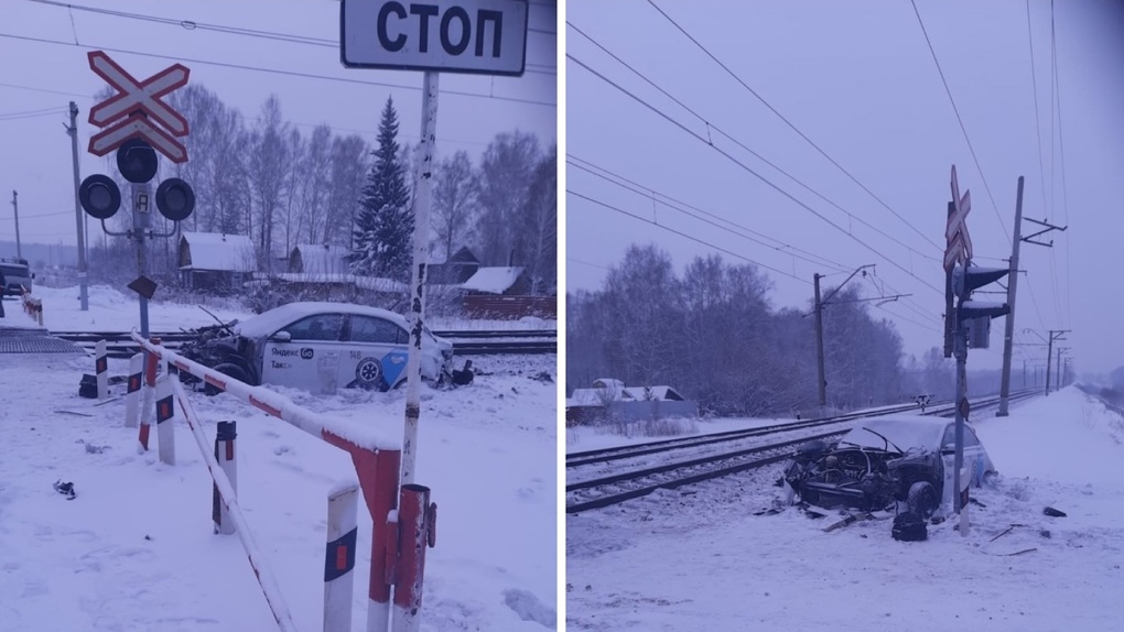 Автомобиль такси попал под грузовой поезд на железнодорожных путях в Новосибирске