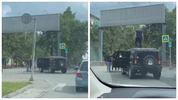 Мужчина станцевал на крыше внедорожника Hummer H2 в центре Новосибирска. ВИДЕО