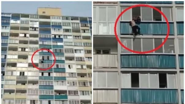 Мужчина повис на балконе 12-этажного здания в Новосибирске. ВИДЕО